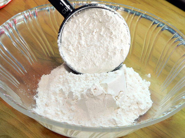 02_Chicken-Fried-Steak_add-flour Preparing the seasoning for the steak.