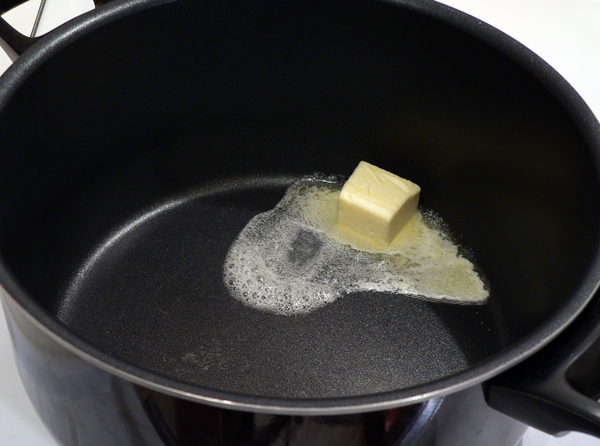 03-Beef-Stew_add-butter Melt some butter in a large pot.