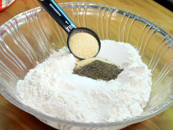 05_Chicken-Fried-Steak_add-garlic-powder Add the garlic powder.