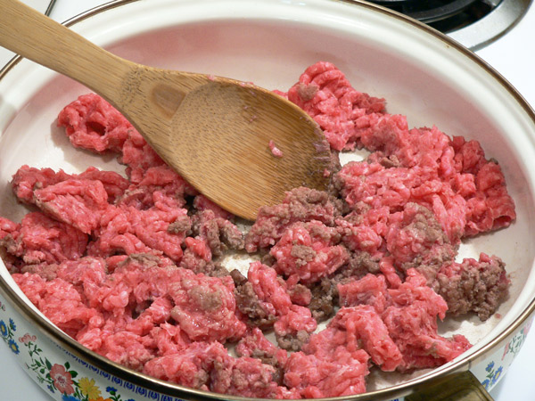 05_Sloppy-Joe's_beef-stir Stir the beef as it cooks.
