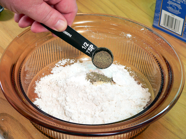 06_Pork-Chops_add-pepper Add black pepper.