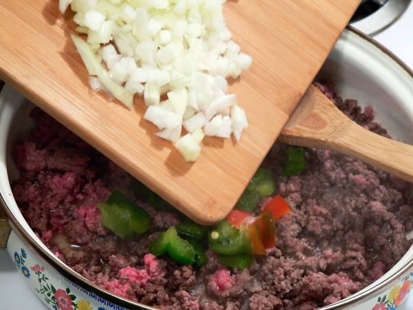 08_Sloppy-Joe's_beef-add-onion Add the chopped onions.
