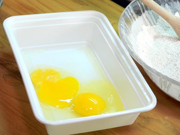 10_Chicken-Fried-Steak_break-eggs Break two eggs into another dish.