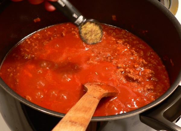 19_Chili-Con-Carne_add-oregano Add the oregano.