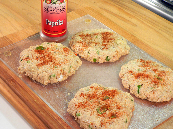 20_Salmon-Patties_add-paprika Sprinkle with paprika.