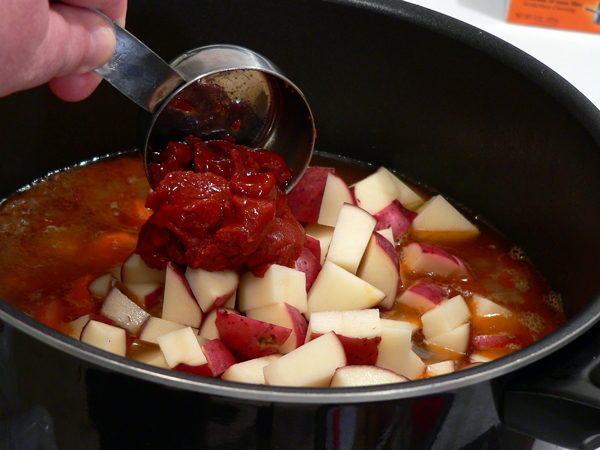 22-Beef-Stew_add-tomato-paste Add the tomato paste.
