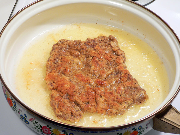 29_Chicken-Fried-Steak_steak-flipped Flip the steak over.