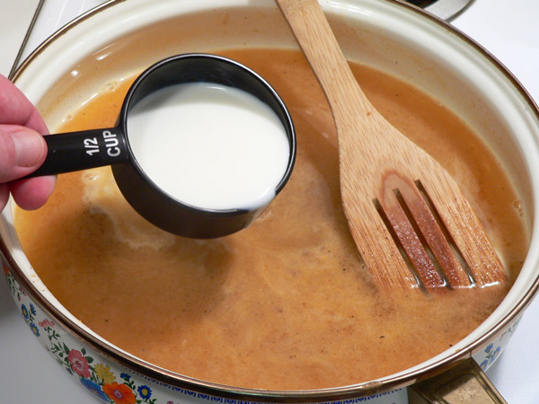 38_Chicken-Fried-Steak_gravy-add-milk Add the milk.