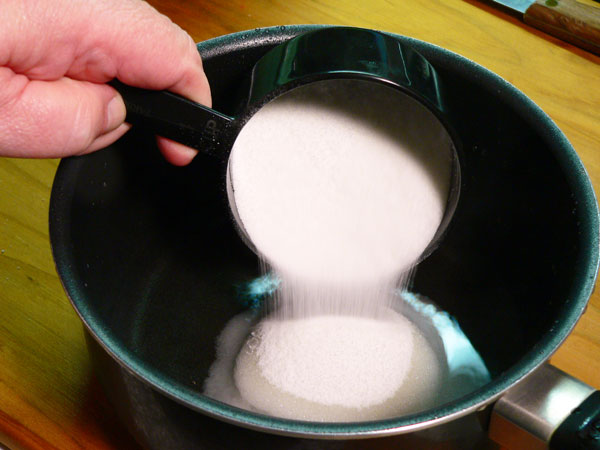 Seven Minute Frosting, add sugar.