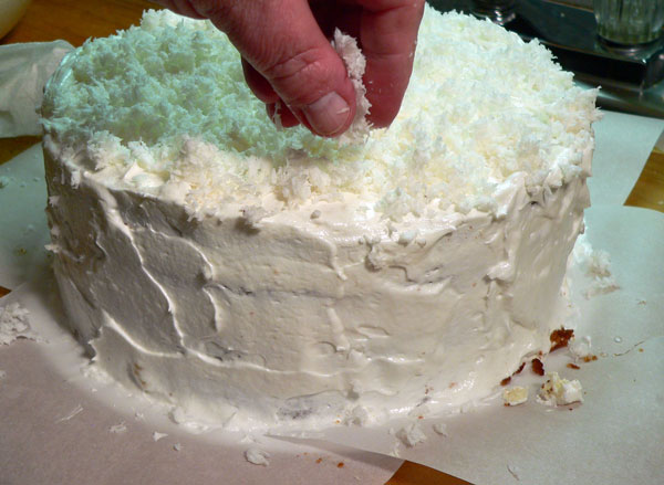 Seven Minute Frosting, adding the coconut.