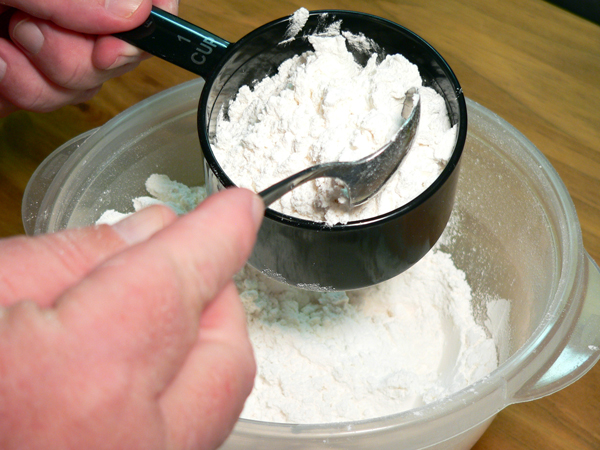 Basic-Pie-Crust_06_spoon-into-measuring-cup Basic Pie Crust, spoon into measuring cup.