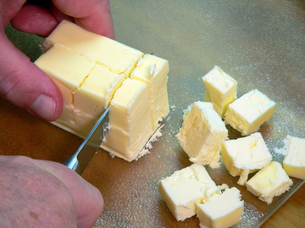 Basic-Pie-Crust_15_slice-again-into-cubes Basic Pie Crust, lay the slices down and slice into cubes.