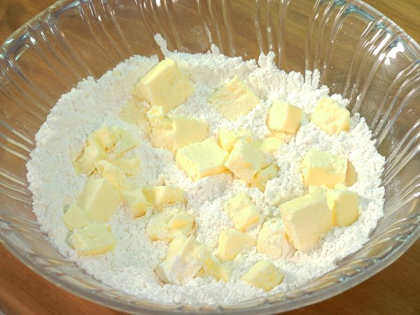 Basic-Pie-Crust_16_add-to-flour Basic Pie Crust, add the butter to the flour.