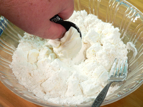 Basic-Pie-Crust_18_add-shortening Basic Pie Crust, add the shortening.