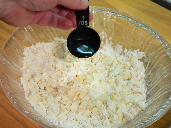 Basic-Pie-Crust_21_add-water Basic Pie Crust, gradually add the cold water.