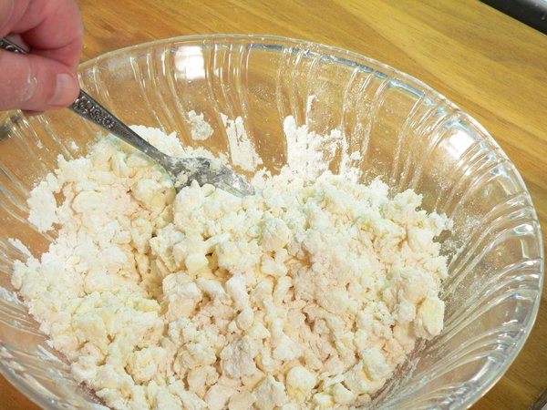 Basic-Pie-Crust_22_stir Basic Pie Crust, stir the mixture.