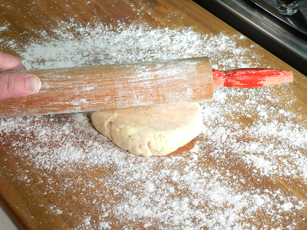 Basic-Pie-Crust_27_pat-dough-out Basic Pie Crust, pat the dough out a bit.