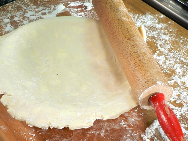 Basic-Pie-Crust_31_drape-over-pie-plate Basic Pie Crust, drape the dough over the pie plate.