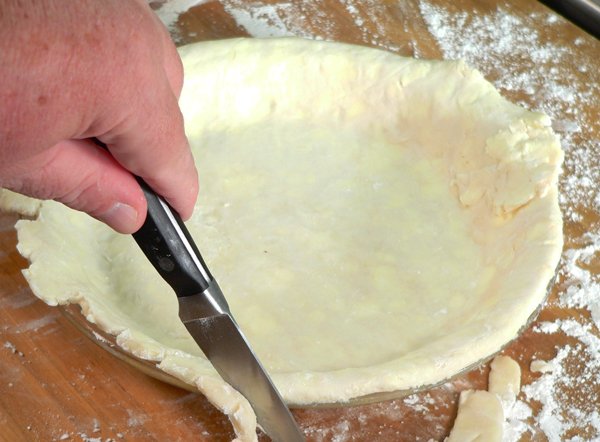 Basic-Pie-Crust_33_trim-edges Basic Pie Crust, trim the edges.