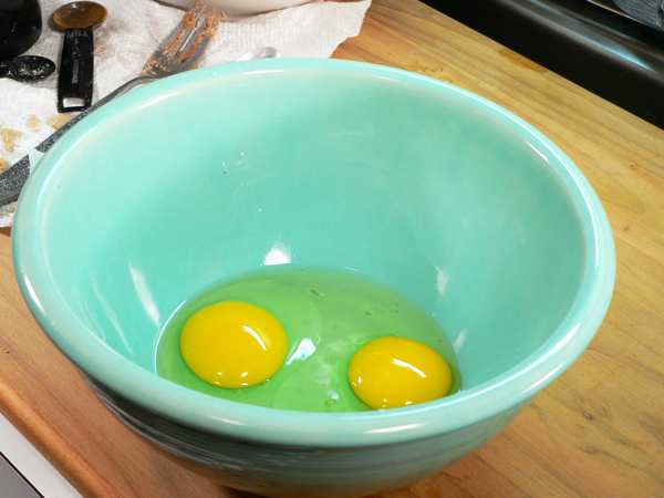 Blueberry-Muffins_15_add-eggs Blueberry Muffins, add eggs to a medium sized bowl.