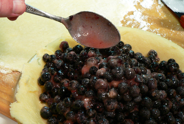 Blueberry-Pie_14_add-berries-to-bottom-crust Blueberry Pie, add berries.