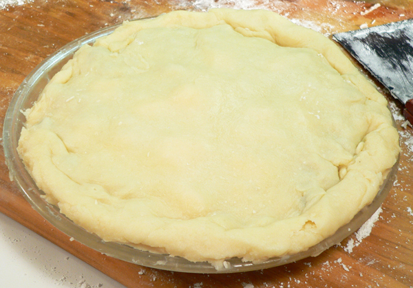 Blueberry-Pie_17_fold-top-under-bottom Blueberry Pie, fold top crust under edge of the bottom crust.
