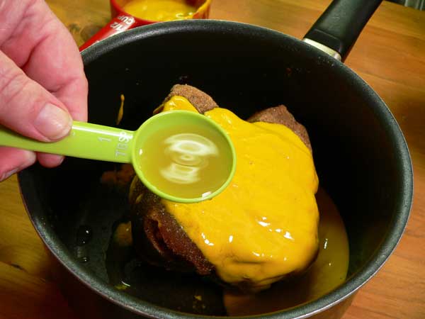 Coca-Cola Glazed Ham, add the vinegar.