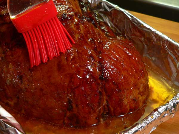 Coca-Cola Glazed Ham, baste the ham.
