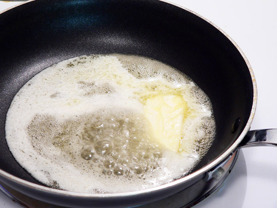 Garlic-Dill-New-Potatoes-butter-07 Melt some butter in the saucepan.