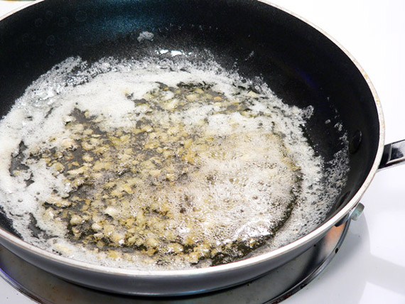 Garlic-Dill-New-Potatoes-garlic-cooking-08 Add the chopped garlic to the butter.