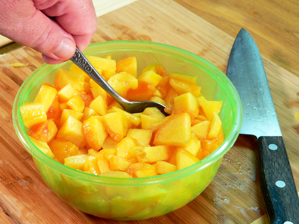 Peach-Preserve-Ice-Cream_10_toss-well Peach Preserve Ice Cream, toss the peaches to coat with juice.
