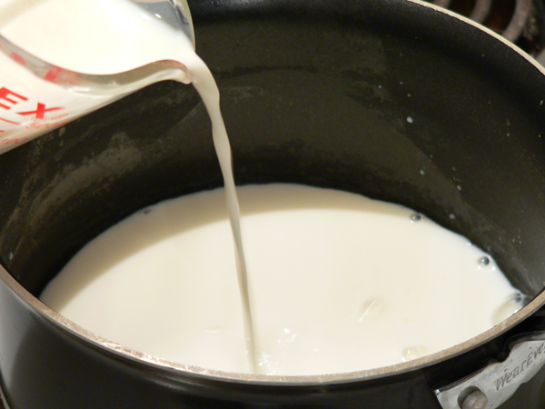 Peach-Preserve-Ice-Cream_16_add-milk Peach Preserve Ice Cream, add milk to saucepan.