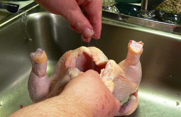 Roast Chicken, sprinkle the inside with salt and pepper.