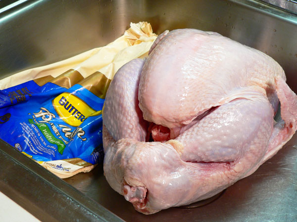 Roast Turkey, remove from wrapper.