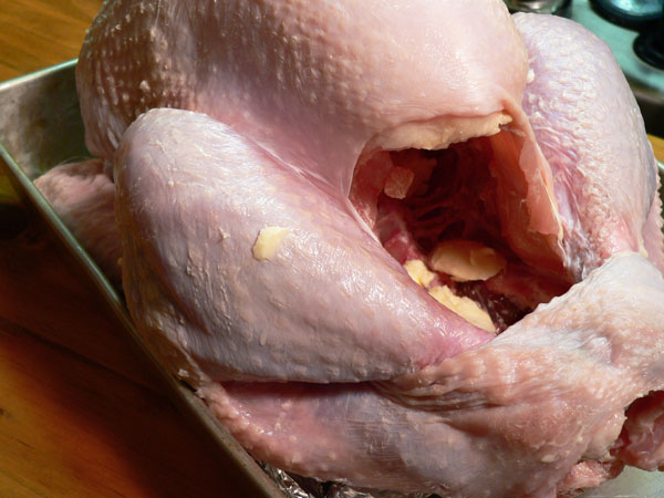 Roast Turkey, butter the inside.