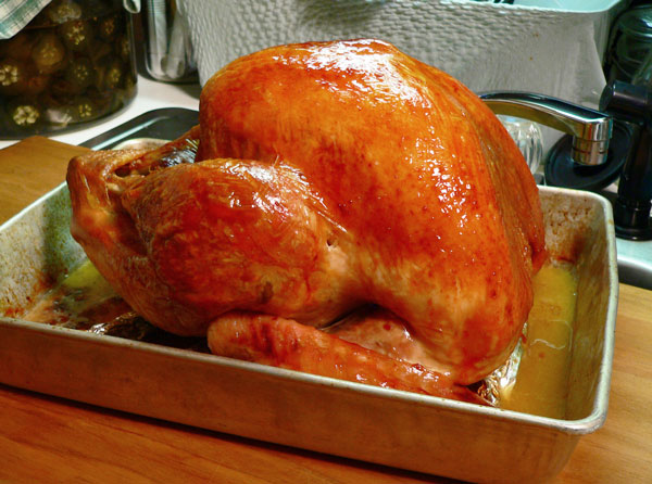 Roast Turkey, remove from oven.