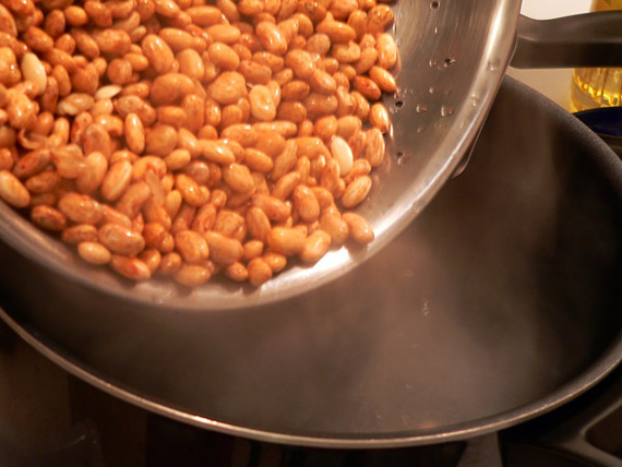 southern-pinto-beans-add-beans-10 Add the pinto beans to the pot of water
