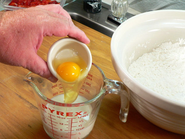 Strawberry-Shortcake_08_add-egg-to-milk Strawberry Shortcake, add egg to milk.