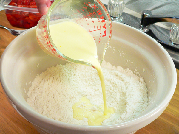 Strawberry-Shortcake_09_add-to-flour Strawberry Shortcake, add the milk mixture to the flour.