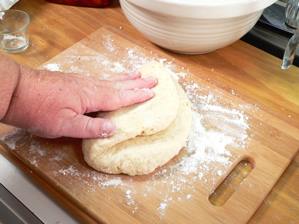 Strawberry-Shortcake_15_fold Strawberry Shortcake, fold the dough over, left to right.