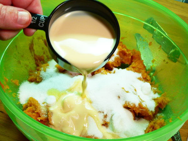 Sweet Potato Pie, add the milk.