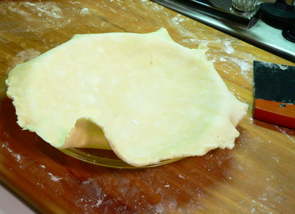 Sweet Potato Pie, place dough in dish.