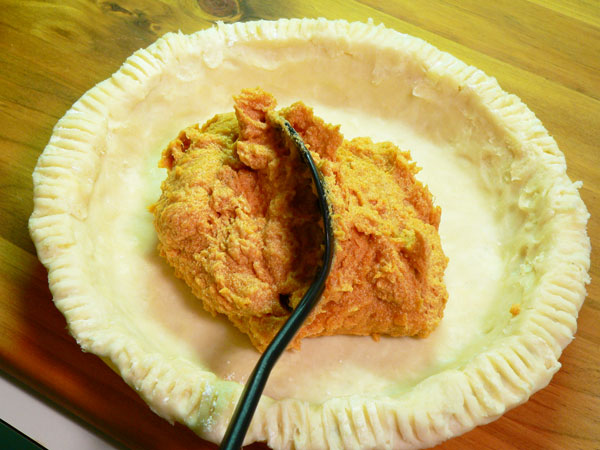 Sweet Potato Pie, add the filling.