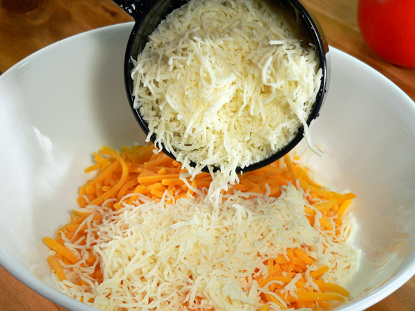 Tomato-Pie_15_add-mozzarella-cheese Tomato Pie Recipe, add in the mozzarella cheese.