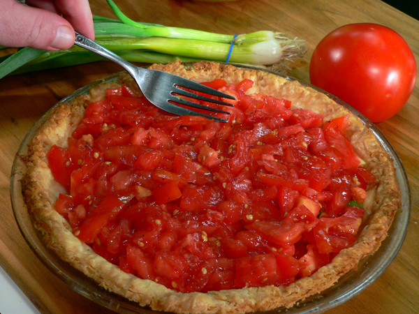 Tomato-Pie_21_add-tomatoes Tomato Pie Recipe, add the drained tomatoes.